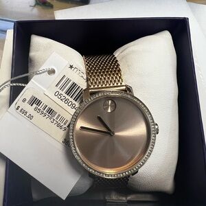 New, never used ladies Movado Bold, rose gold watch.